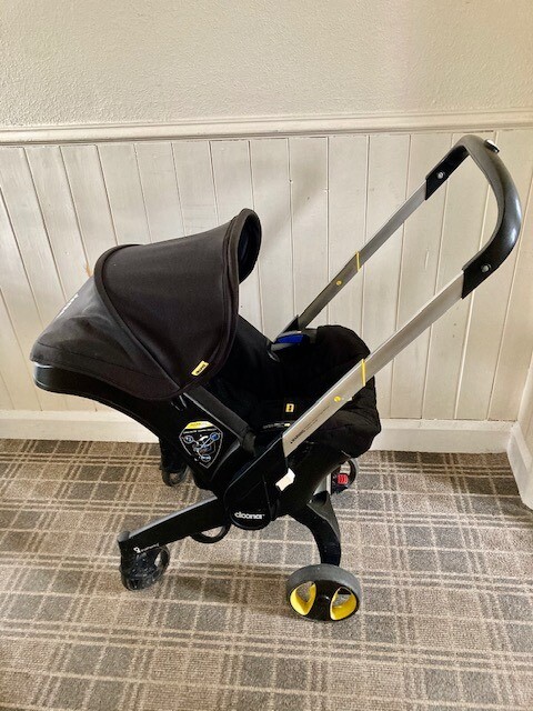 DOONA Stroller / Car Seat. Black. (Pram 